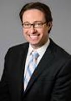 Adam J Fechner