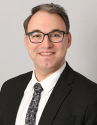 Adam J Sagot